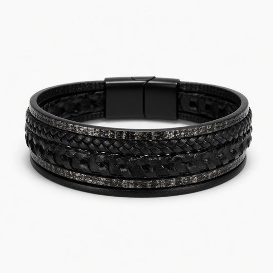 Multi-layer black men's bracelet featuring braided leather and textured industrial steel strands with a matte black magnetic clasp.