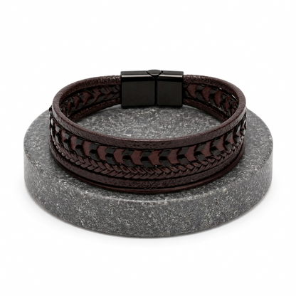 Modern industrial style men's bracelet with a multi-strand leather and metal design, perfect for a rugged-refined look.