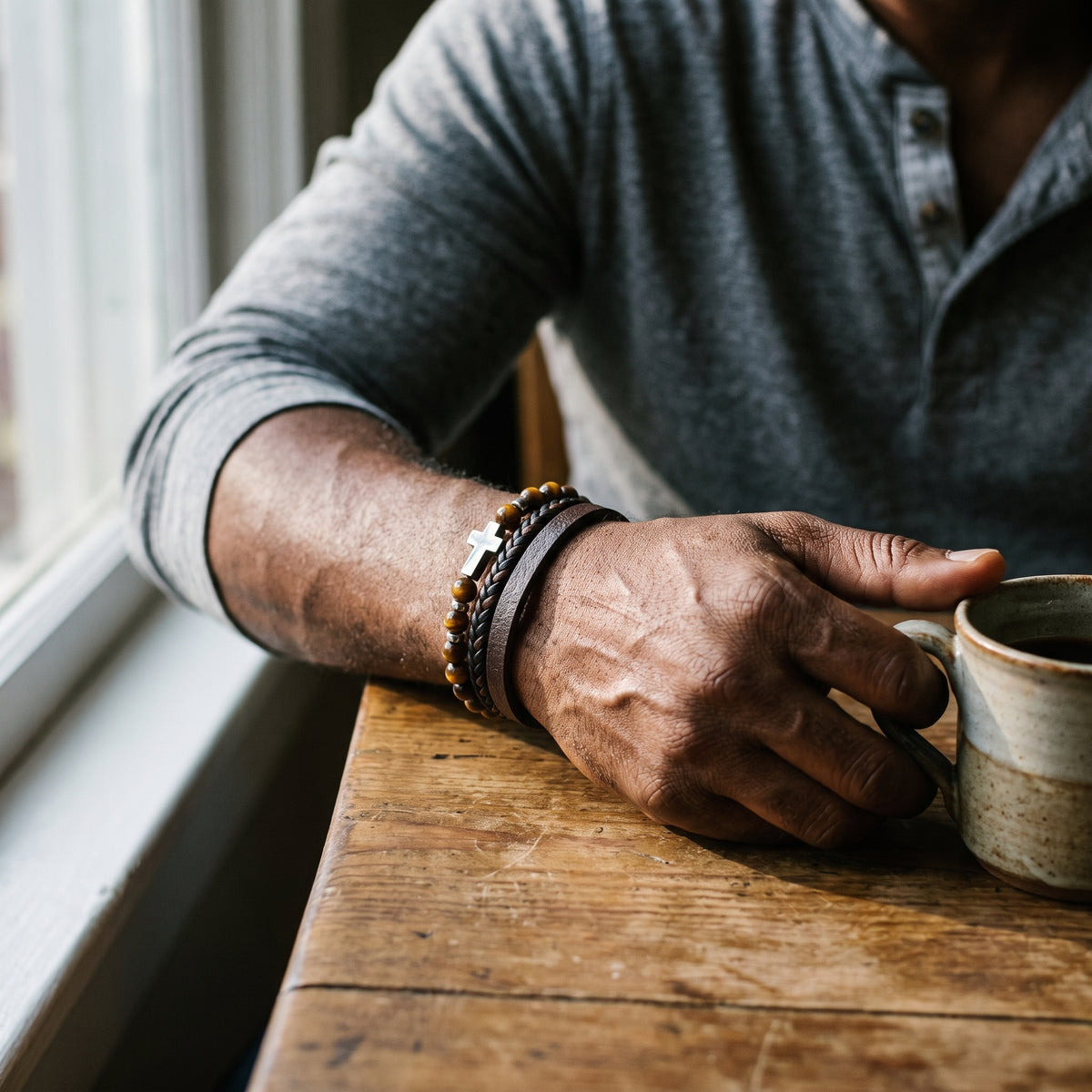 The Anchor Multi-Layer Leather & Tiger’s Eye Cross Bracelet worn, lifestyle photo 1