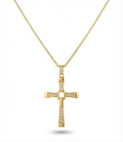 Gold Dominic Toretto style cross pendant necklace with sparkling stone accents displayed against a plain white background.