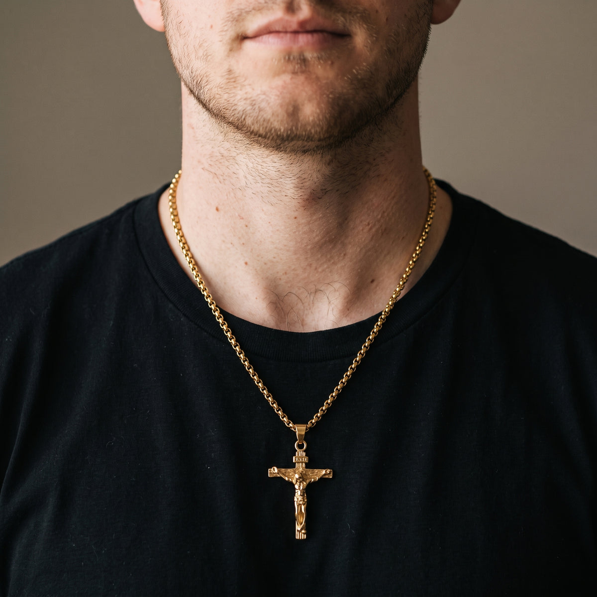 Gold Crucifix Cross Pendant Necklace worn, lifestyle photo 1