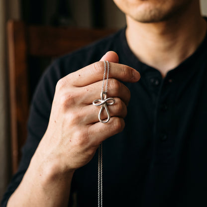 925 Sterling Silver Infinity Cross Pendant Necklace worn, lifestyle photo 4