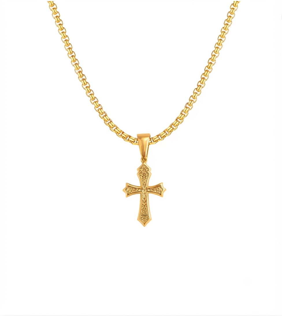 Men's gold engraved cross pendant necklace with a matching box chain, isolated on a white background.