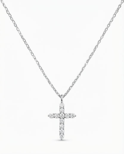 Sterling silver pavé diamond cross pendant necklace displayed against a plain white background.