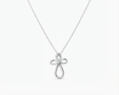 Sterling silver infinity loop cross pendant necklace displayed against a plain white background.